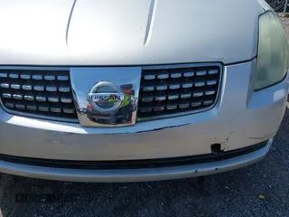 2004 Nissan Maxima SL with VIN 1N4BA41E84C822059, listed as a IAAI auction lot 42032195 with 213,650 mi miles. Bid and sale history available at carsss.com. Image 6.