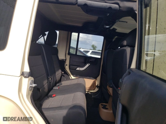 2011 Jeep Wrangler Unlimited Sahara with VIN 1J4BA5H19BL593658, listed as a Copart auction lot 71947684 with 122,323 mi miles and Salvage Title. Bid and sale history available at carsss.com. Image 11.