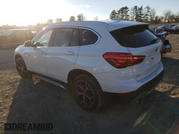 2018 BMW X1 xDrive28i with VIN WBXHT3C38J5L31384, listed as a Copart auction lot 66323172 with 74,272 mi miles. Bid and sale history available at carsss.com. Image 3.