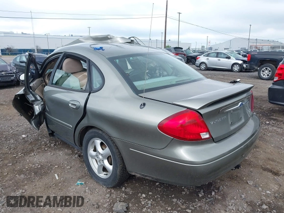 2003 Ford Taurus SES Standard with VIN 1FAFP55293A193556, listed as a IAAI auction lot 42562880 with 144,902 mi miles and . Bid and sale history available at DreamBid. Image 3.