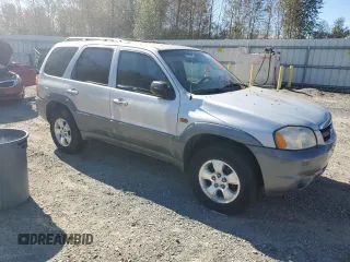 2001 Mazda Tribute LX with VIN 4F2YU08101KM57112, listed as a Copart auction lot 73372454 with 196,098 mi miles and Clean Title. Bid and sale history available at carsss.com. Image 4.