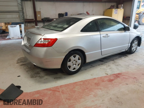 2006 Honda Civic Cpe LX with VIN 2HGFG126X6H532696, listed as a IAAI auction lot 42016264 with 209,509 mi miles. Bid and sale history available at carsss.com. Image 4.