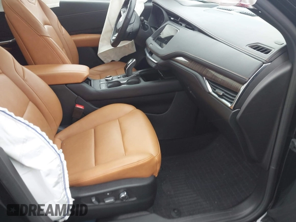 2023 Cadillac XT4 AWD Sport with VIN 1GYFZFR43PF104069, listed as a IAAI auction lot 41736071 with 22,872 mi miles. Bid and sale history available at carsss.com. Image 5.