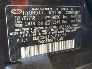 2019 Genesis G70 3.3T Advanced with VIN KMTG34LE7KU017766, listed as a Copart auction lot 72652614 with 58,634 mi miles and Salvage Title. Bid and sale history available at carsss.com. Image 15.