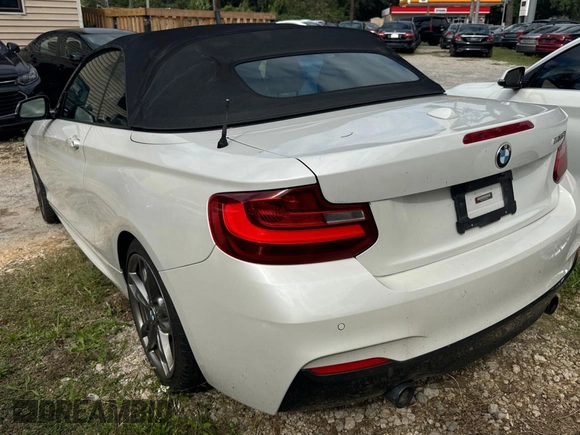 2015 BMW 2 Series M235i with VIN WBA1M1C56FV393758, listed as a Copart auction lot 81534244 with 51,015 mi miles and Salvage Title. Bid and sale history available at carsss.com. Image 3.