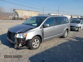 2013 Dodge Grand Caravan SXT with VIN 2C4RDGCG3DR553217, listed as a IAAI auction lot 41898964 with 101,989 mi miles and . Bid and sale history available at DreamBid. Image 2.