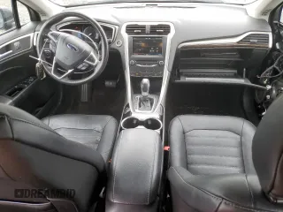 2015 Ford Fusion SE z VIN 3FA6P0H95FR206535, wystawiony jako Copart lot #54242105 z przebiegiem 83 001 mil mil oraz Szkoda całkowita • Salvage title. Historia ofert i sprzedaży dostępna na DreamBid. Obrazek 8.