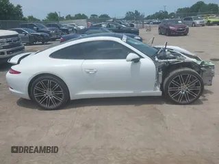 2015 Porsche 911 Carrera z VIN WP0AA2A90FS100123, wystawiony jako IAAI lot #42339229 z przebiegiem 135 198 mil mil oraz . Historia ofert i sprzedaży dostępna na DreamBid. Obrazek 13.