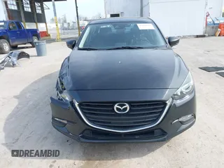 2017 Mazda 3 Touring z VIN 3MZBN1V74HM133565, wystawiony jako IAAI lot #42160836 z przebiegiem 104 997 mil mil oraz . Historia ofert i sprzedaży dostępna na DreamBid. Obrazek 12.