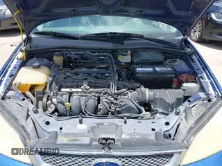 2005 Ford Focus S with VIN 1FAFP34N65W158687, listed as a IAAI auction lot 42706418 with Not provided miles and . Bid and sale history available at DreamBid. Image 10.