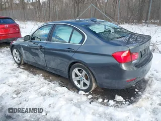 2015 BMW 3 Series 328i xDrive with VIN WBA3B5G55FNS14903, listed as a IAAI auction lot 41497975 with 62,009 mi miles. Bid and sale history available at carsss.com. Image 3.