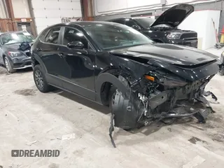 2021 Mazda CX-30 S with VIN 3MVDMBAL0MM226504, listed as a IAAI auction lot 41619102 with 87,998 mi miles and . Bid and sale history available at carsss.com. Image 1.
