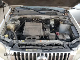 2010 Mercury Mariner Premier with VIN 4M2CN9HG6AKJ00320, listed as a Copart auction lot 77432934 with 201,699 mi miles and Salvage Title. Bid and sale history available at carsss.com. Image 12.