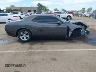 2019 Dodge Challenger SXT z VIN 2C3CDZAG8KH666463, wystawiony jako IAAI lot #42002571 z przebiegiem 78 629 mil mil oraz . Historia ofert i sprzedaży dostępna na DreamBid. Obrazek 13.