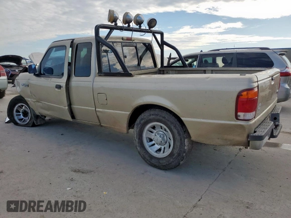 1999 Ford Ranger XL with VIN 1FTYR14VXXPA72216, listed as a Copart auction lot 61868295 with 230,074 mi miles and Salvage title. Bid and sale history available at DreamBid. Image 2.