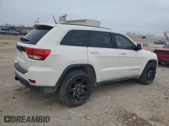 2012 Jeep Grand Cherokee Laredo with VIN 1C4RJFAT9CC354022, listed as a Copart auction lot 50059855 with 205,541 mi miles and Salvage Title. Bid and sale history available at carsss.com. Image 3.