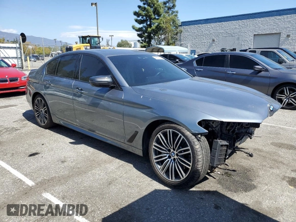 2020 BMW 5 Series 530e with VIN WBAJA9C06LCE66990, listed as a Copart auction lot 48823925 with 57,673 mi miles and Salvage Title. Bid and sale history available at DreamBid. Image 4.