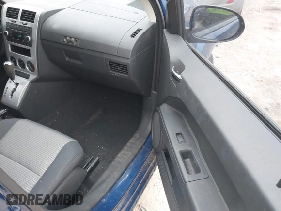 2009 Dodge Caliber SXT with VIN 1B3HB48AX9D116489, listed as a IAAI auction lot 41424585 with 45,546 mi miles and . Bid and sale history available at DreamBid. Image 5.