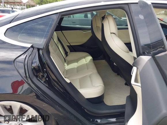 2017 Tesla Model S 60 z VIN 5YJSA1E13HF228486, wystawiony jako IAAI lot #42092686 z przebiegiem 78 089 mil mil oraz . Historia ofert i sprzedaży dostępna na DreamBid. Obrazek 8.