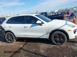 2016 Porsche Cayenne with VIN WP1AA2A20GKA36068, listed as a IAAI auction lot 41828945 with 86,938 mi miles. Bid and sale history available at carsss.com. Image 14.