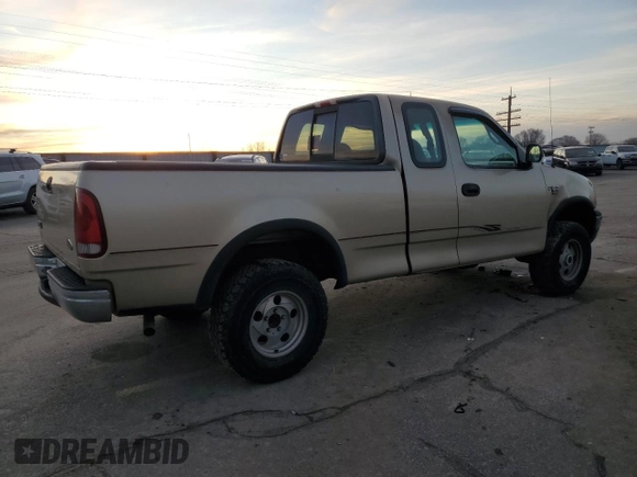 1999 Ford F-150 z VIN 2FTRX18W3XCA06671, wystawiony jako Copart lot #85561784 z przebiegiem 100 579 mil mil oraz Szkoda całkowita • Salvage title. Historia ofert i sprzedaży dostępna na DreamBid. Obrazek 3.