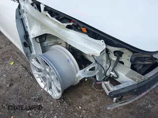 2022 Tesla Model Y Long Range z VIN 7SAYGDEE0NF435252, wystawiony jako IAAI lot #41449612 z przebiegiem 48 671 mil mil oraz . Historia ofert i sprzedaży dostępna na DreamBid. Obrazek 6.
