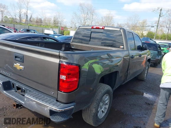2014 Chevrolet Silverado 1500 LT with VIN 1GCRCREC6EZ413419, listed as a IAAI auction lot 41983067 with 168,011 mi miles and . Bid and sale history available at DreamBid. Image 4.