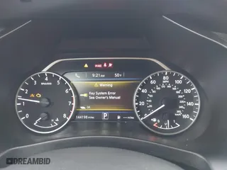2016 Nissan Murano SL with VIN 5N1AZ2MH9GN164961, listed as a IAAI auction lot 41801749 with 144,198 mi miles. Bid and sale history available at carsss.com. Image 7.