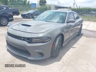 2019 Dodge Charger Scat Pack with VIN 2C3CDXGJ2KH633854, listed as a IAAI auction lot 42212517 with 74,285 mi miles and . Bid and sale history available at DreamBid. Image 2.