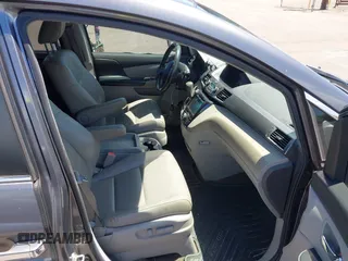 2014 Honda Odyssey EX-L with VIN 5FNRL5H69EB018557, listed as a IAAI auction lot 42855051 with 165,081 mi miles and . Bid and sale history available at DreamBid. Image 5.