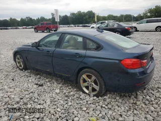 2015 BMW 4 Series 428i xDrive with VIN WBA4C9C57FD330687, listed as a Copart auction lot 67639034 with 114,779 mi miles and Salvage title. Bid and sale history available at DreamBid. Image 2.