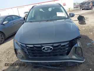 2022 Hyundai Tucson SEL with VIN 5NMJBCAEXNH031855, listed as a IAAI auction lot 41677386 with 40,606 mi miles and . Bid and sale history available at DreamBid. Image 13.