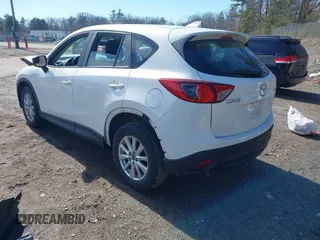 2016 Mazda CX-5 Sport with VIN JM3KE2BY9G0887110, listed as a IAAI auction lot 41761039 with 86,624 mi miles. Bid and sale history available at carsss.com. Image 3.