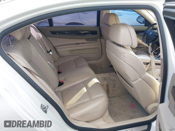 2011 BMW 7 Series 750Li with VIN WBAKB8C57BCY66558, listed as a IAAI auction lot 41494697 with 102,560 mi miles. Bid and sale history available at carsss.com. Image 8.