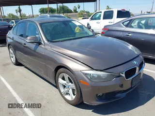 2015 BMW 3 Series 320i with VIN WBA3B1C52FK138265, listed as a IAAI auction lot 42750783 with 127,965 mi miles and . Bid and sale history available at DreamBid. Image 1.