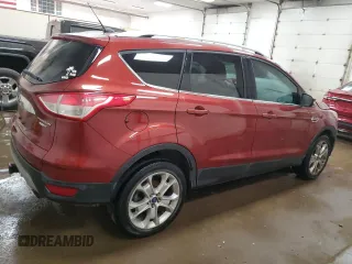 2016 Ford Escape Titanium with VIN 1FMCU9J95GUC57205, listed as a Copart auction lot 71033934 with 90,477 mi miles and Salvage Title. Bid and sale history available at DreamBid. Image 3.