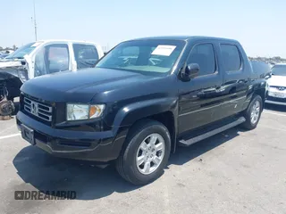 2006 Honda Ridgeline RTL with VIN 2HJYK16576H566002, listed as a IAAI auction lot 42595698 with 212,637 mi miles and . Bid and sale history available at DreamBid. Image 2.