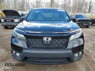 2019 Honda Passport EX-L z VIN 5FNYF8H59KB027590, wystawiony jako Copart lot #53875665 z przebiegiem 57 911 mil mil oraz Czysty tytuł • Clean title. Historia ofert i sprzedaży dostępna na DreamBid. Obrazek 5.