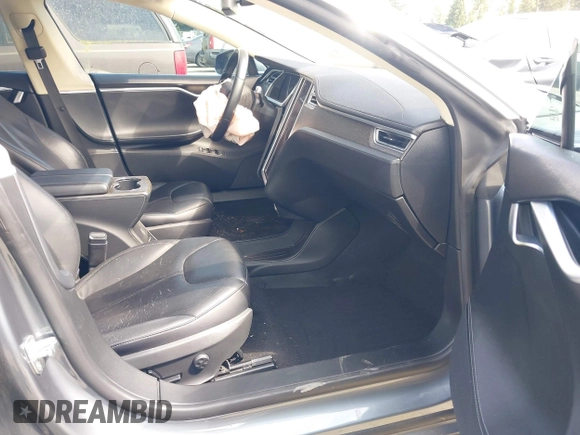 2014 Tesla Model S 60 with VIN 5YJSA1H18EFP38078, listed as a IAAI auction lot 42748619 with 159,285 mi miles and . Bid and sale history available at DreamBid. Image 5.