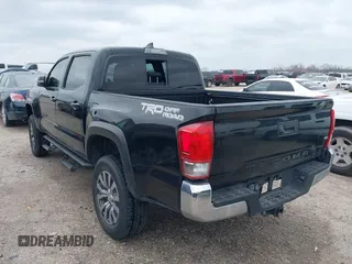 2017 Toyota Tacoma SR5 with VIN 5TFAZ5CN8HX052459, listed as a IAAI auction lot 41495281 with 212,314 mi miles and . Bid and sale history available at DreamBid. Image 3.
