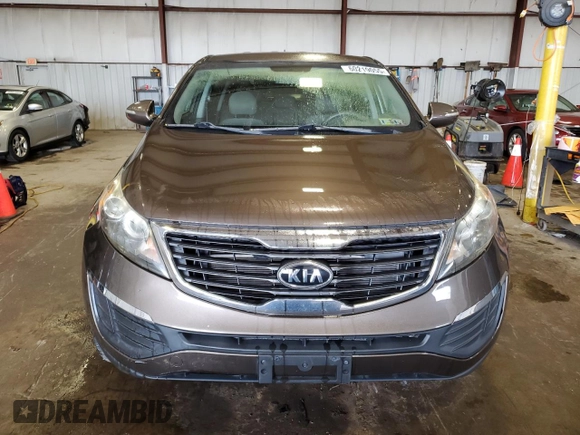 2012 Kia Sportage LX with VIN KNDPB3A28C7331687, listed as a Copart auction lot 60219055 with 87,591 mi miles and Salvage title. Bid and sale history available at DreamBid. Image 5.