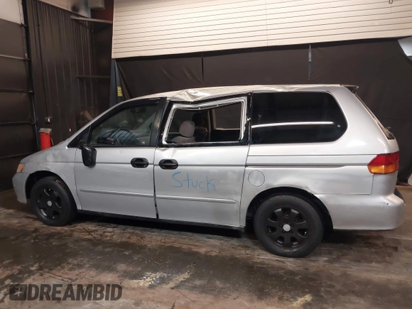 2002 Honda Odyssey LX z VIN 2HKRL18532H573727, wystawiony jako IAAI lot #42266783 z przebiegiem 127 491 mil mil oraz . Historia ofert i sprzedaży dostępna na DreamBid. Obrazek 6.