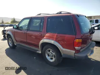 2001 Ford Explorer z VIN 1FMDU64P21UB11722, wystawiony jako Copart lot #57425525 z przebiegiem 116 938 mil mil oraz Szkoda całkowita • Salvage title. Historia ofert i sprzedaży dostępna na DreamBid. Obrazek 2.