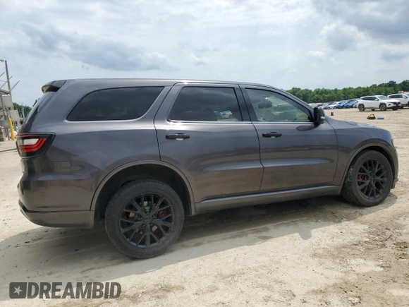 2015 Dodge Durango Limited with VIN 1C4RDJDG0FC904897, listed as a Copart auction lot 58985025 with 147,139 mi miles and Salvage title. Bid and sale history available at DreamBid. Image 3.
