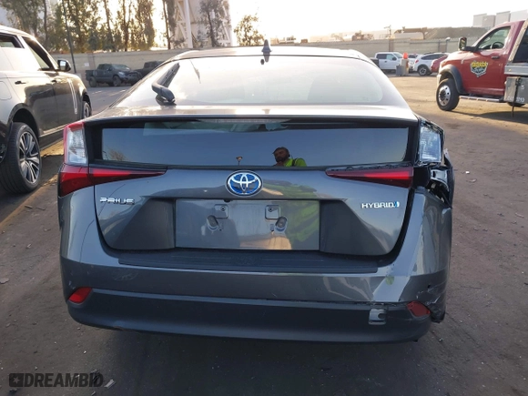 2020 Toyota Prius L Eco with VIN JTDKARFU9L3122010, listed as a IAAI auction lot 41969655 with 76,250 mi miles. Bid and sale history available at carsss.com. Image 16.