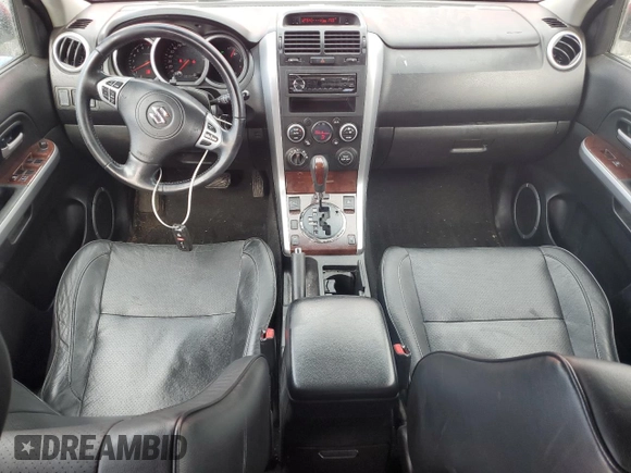 2008 Suzuki Grand Vitara Luxury z VIN JS3TD947084100425, wystawiony jako Copart lot #44932925 z przebiegiem 181 473 mil mil oraz Szkody całkowita. Historia ofert i sprzedaży dostępna na DreamBid. Obrazek 8.