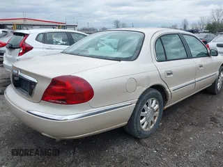 1999 Lincoln Continental with VIN 1LNHM97V1XY691852, listed as a IAAI auction lot 41820994 with 98,858 mi miles and . Bid and sale history available at DreamBid. Image 4.