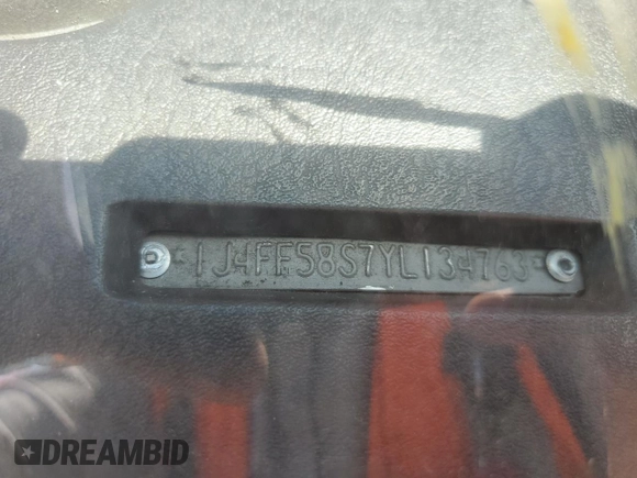 2000 Jeep Cherokee Classic с VIN 1J4FF58S7YL134763, выставлен на аукционе Copart как лот 55957205 с пробегом 229 160 миль миль и Списание • Salvage title. История ставок и продаж доступна на DreamBid. Изображение 12.