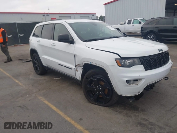 2018 Jeep Grand Cherokee Laredo E with VIN 1C4RJFAG2JC503130, listed as a IAAI auction lot 41527333 with 95,669 mi miles. Bid and sale history available at carsss.com. Image 1.
