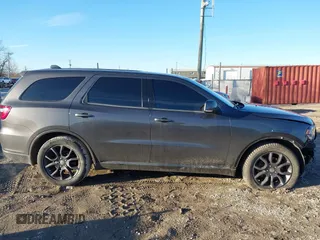 2016 Dodge Durango R/T with VIN 1C4SDJCT5GC308900, listed as a IAAI auction lot 41747190 with 80,255 mi miles and . Bid and sale history available at DreamBid. Image 14.